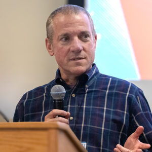 Rob Kohlhepp speaks into a microphone