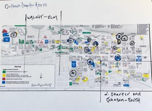 Map of campus with hand-drawn markings indicating places for new computer kiosks.