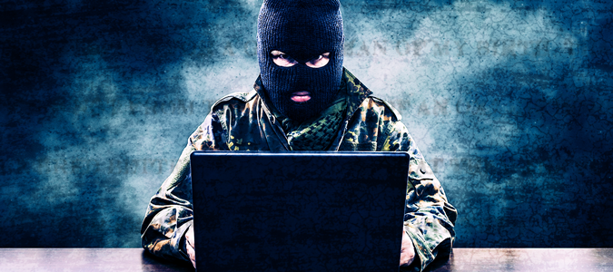 Bad guy in front of laptop