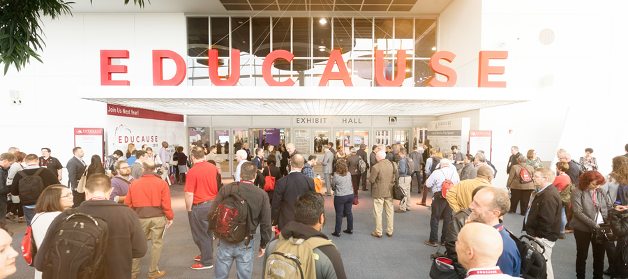 EDUCAUSE exhibit hall building with attendees gathering