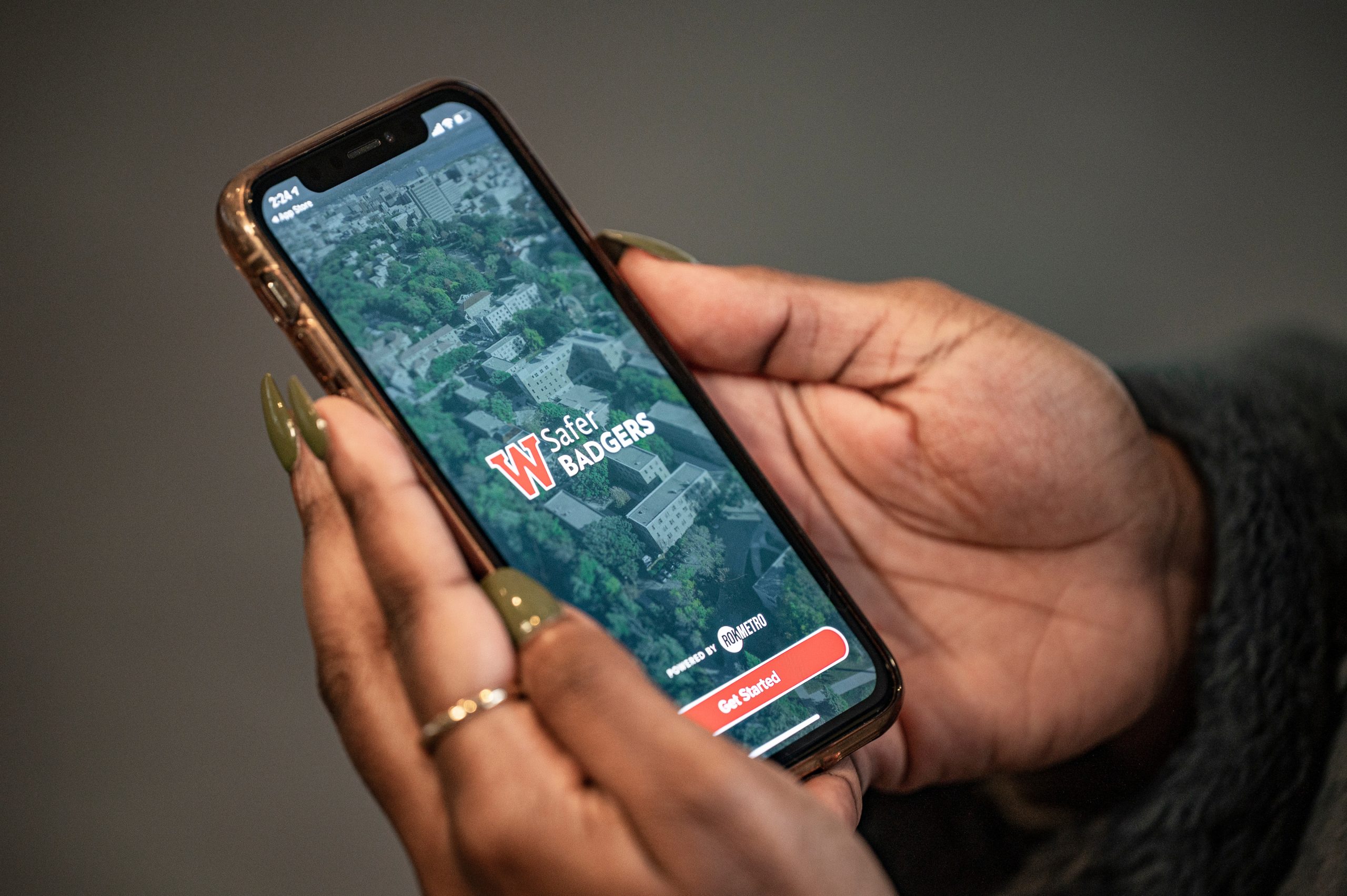 A student uses a mobile application on their phone