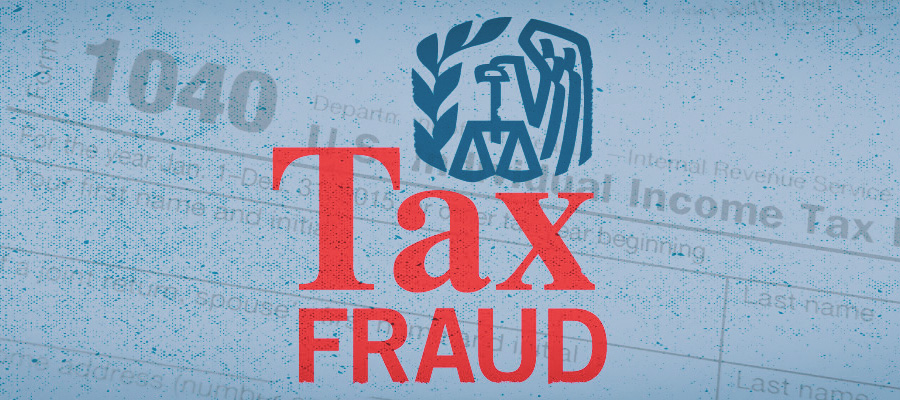 "Tax Fraud" written on top of a 1040 document