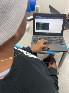 An Orchard Ridge 5th grade student explores the menu of games created by ITA students and developed by their classmates